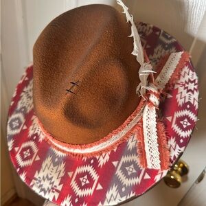 Brown and Red Patterned Hat with Feather